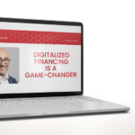 Laptop with Automotive News article